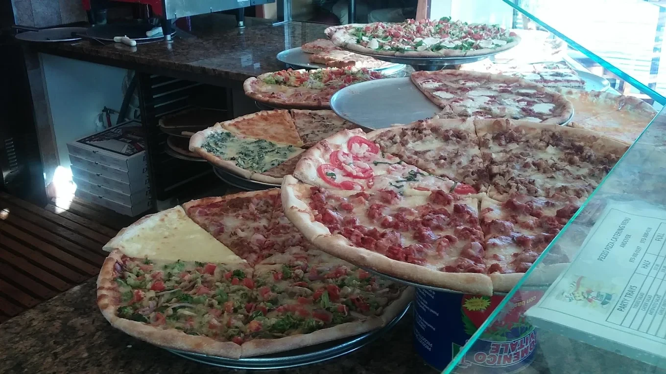 Pizza dough being prepared in kitchen